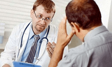 Patient consults with doctor